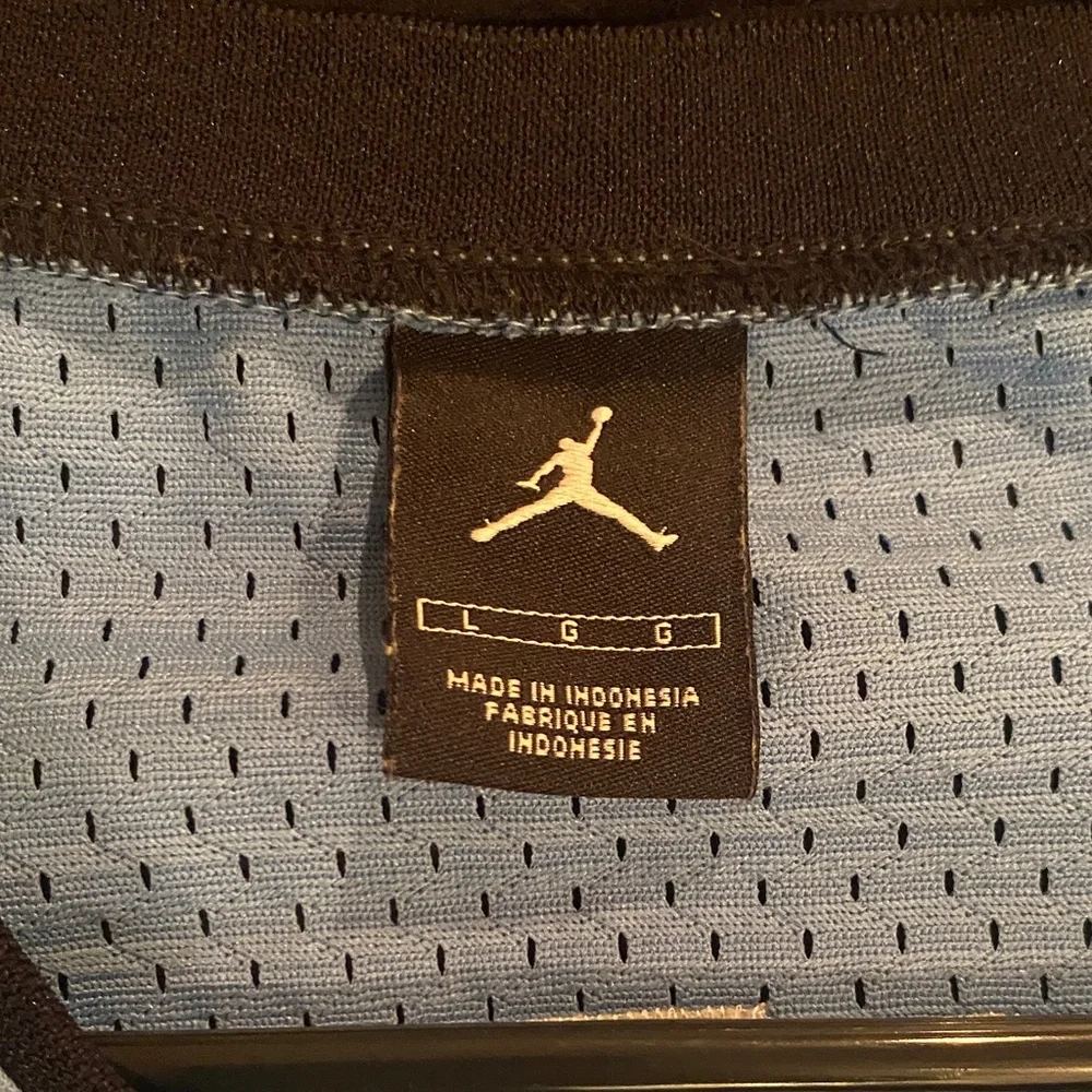Jordan Carolina Blue and Black Basketball Jersey
